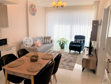 Новая квартира 1+1 в комфортабельной резиденции в центре Аланьи и в 450 метрах от  знаменитого пляжа Клеопатры.-id-4702-фото-2