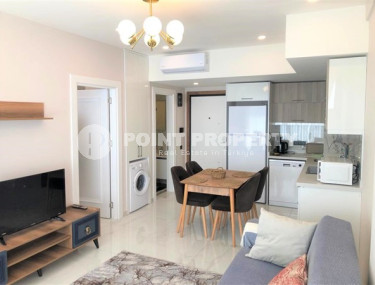 Новая квартира 1+1 в комфортабельной резиденции в центре Аланьи и в 450 метрах от  знаменитого пляжа Клеопатры.-id-4702-фото-4