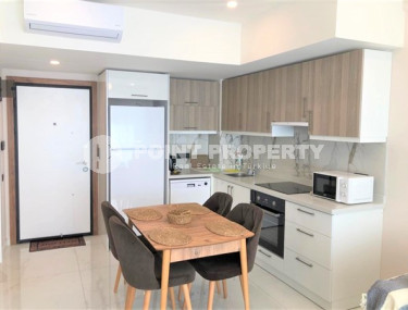 Новая квартира 1+1 в комфортабельной резиденции в центре Аланьи и в 450 метрах от  знаменитого пляжа Клеопатры.-id-4702-фото-5