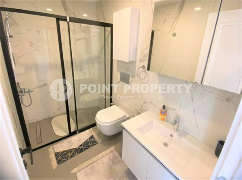 Новая квартира 1+1 в комфортабельной резиденции в центре Аланьи и в 450 метрах от  знаменитого пляжа Клеопатры.-id-4702-фото-7