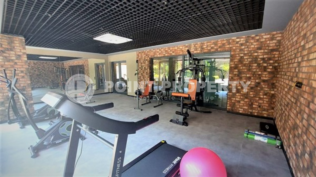 Новая квартира 1+1 в комфортабельной резиденции в центре Аланьи и в 450 метрах от  знаменитого пляжа Клеопатры.-id-4702-фото-9