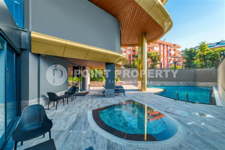 Новая квартира 1+1 в комфортабельной резиденции в центре Аланьи и в 450 метрах от  знаменитого пляжа Клеопатры.-id-4702-фото-15