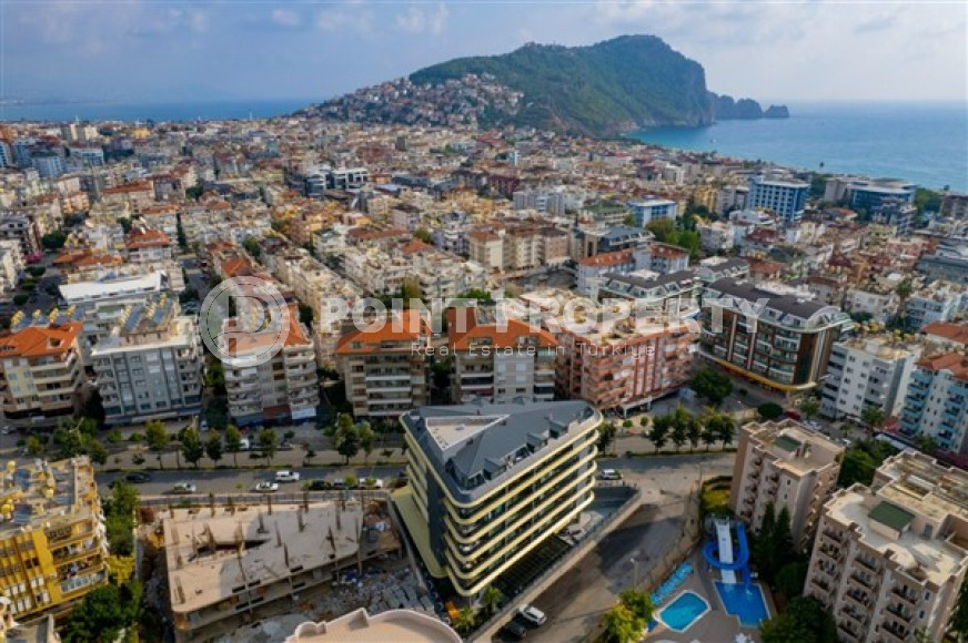 Новая квартира 1+1 в комфортабельной резиденции в центре Аланьи и в 450 метрах от  знаменитого пляжа Клеопатры.-id-4702-фото-18