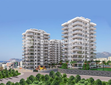 Three apartments with a 2+1 layout in a complex under construction, Mahmutlar district. The completion date of the work is August 2023.-id-4706-photo-1