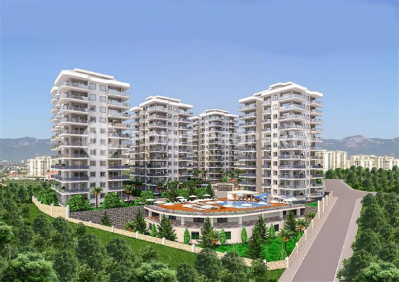 Three apartments with a 2+1 layout in a complex under construction, Mahmutlar district. The completion date of the work is August 2023.-id-4706-photo-2