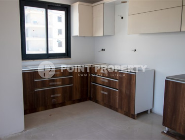 Three apartments with a 2+1 layout in a complex under construction, Mahmutlar district. The completion date of the work is August 2023.-id-4706-photo-3