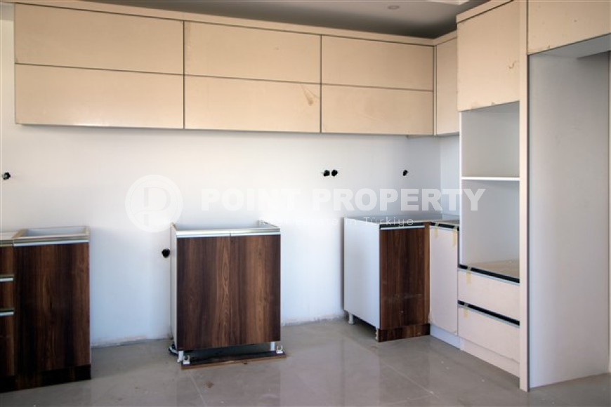 Three apartments with a 2+1 layout in a complex under construction, Mahmutlar district. The completion date of the work is August 2023.-id-4706-photo-4