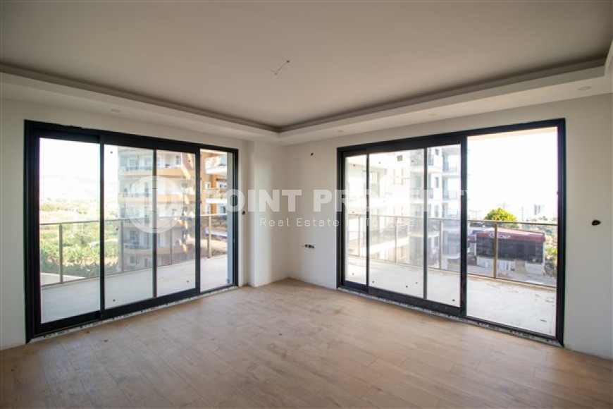 Three apartments with a 2+1 layout in a complex under construction, Mahmutlar district. The completion date of the work is August 2023.-id-4706-photo-6