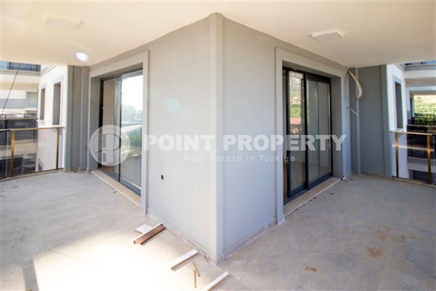 Three apartments with a 2+1 layout in a complex under construction, Mahmutlar district. The completion date of the work is August 2023.-id-4706-photo-8