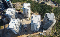 Three apartments with a 2+1 layout in a complex under construction, Mahmutlar district. The completion date of the work is August 2023.-id-4706-photo-9