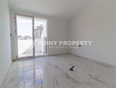 New 2+1 penthouse with an area of 110 m2 on the 5th floor of the complex, Mahmutlar district-id-4707-photo-5