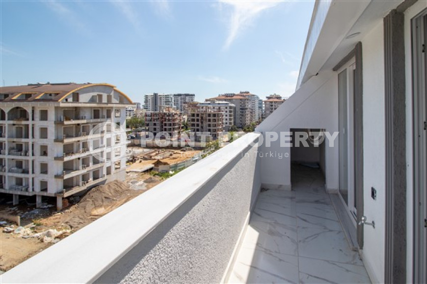New 2+1 penthouse with an area of 110 m2 on the 5th floor of the complex, Mahmutlar district-id-4707-photo-11