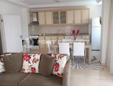 Комфортабельная вторичная квартира 2+1 с мебелью в 50 метрах от центра района Махмутлар-id-4708-фото-2