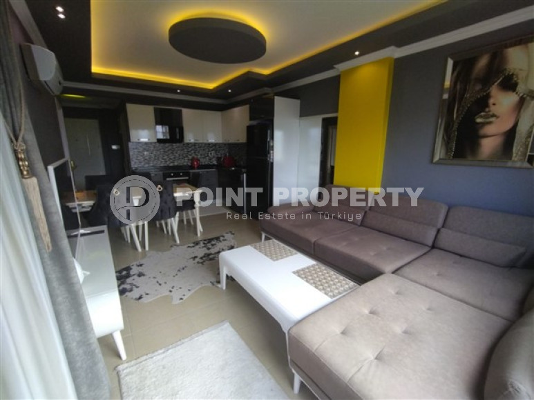 Nice apartment 66 m2 with 1+1 room layout in Mahmutlar area-id-4713-photo-2