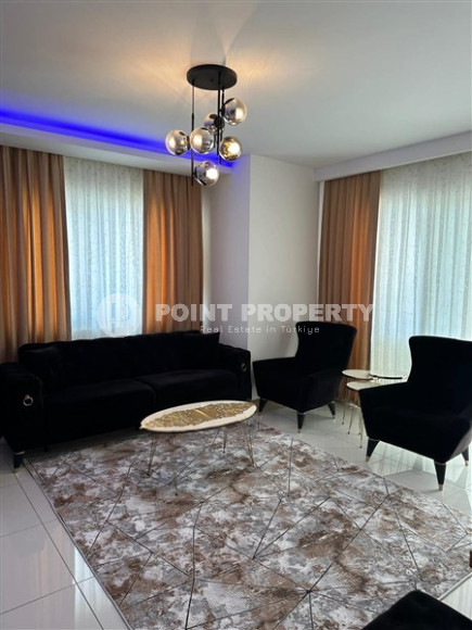Modern two-room apartment with an area of 65 m2 and a balcony in the Mahmutlar area-id-4715-photo-2