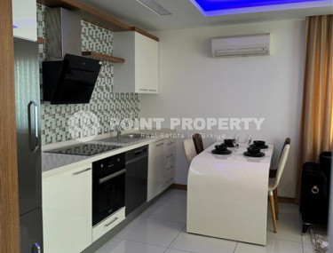 Modern two-room apartment with an area of 65 m2 and a balcony in the Mahmutlar area-id-4715-photo-3