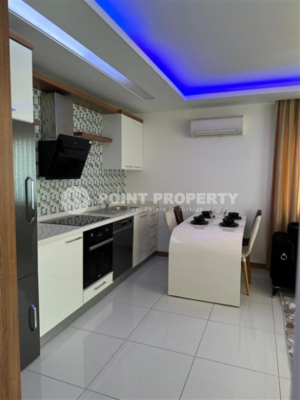 Modern two-room apartment with an area of 65 m2 and a balcony in the Mahmutlar area-id-4715-photo-3