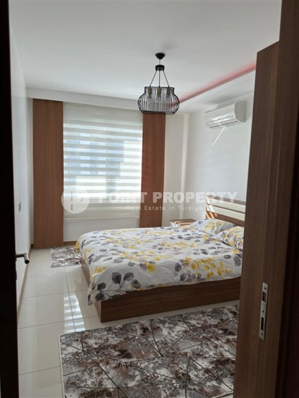 Modern two-room apartment with an area of 65 m2 and a balcony in the Mahmutlar area-id-4715-photo-5