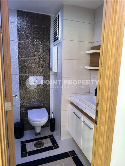 Modern two-room apartment with an area of 65 m2 and a balcony in the Mahmutlar area-id-4715-photo-6