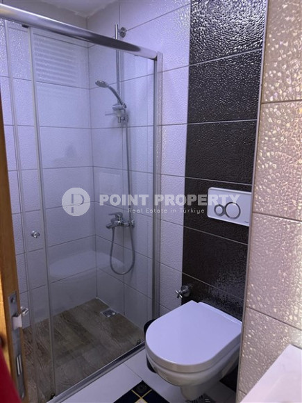 Modern two-room apartment with an area of 65 m2 and a balcony in the Mahmutlar area-id-4715-photo-7