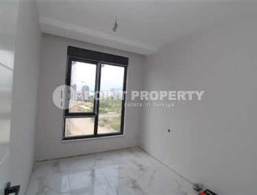 Apartment 2+1 at the final stage of construction in the center of Mahmutlar-id-4720-photo-2