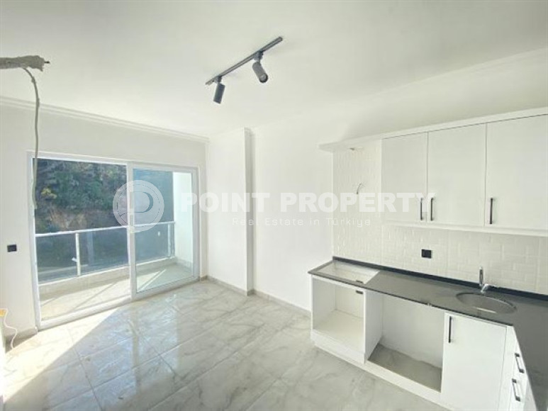 Небольшая квартира 1+1 с чистовой отделкой на 3-м этаже в новой резиденции, введенной в эксплуатацию в 2022 году.-id-4724-фото-2