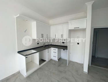 Небольшая квартира 1+1 с чистовой отделкой на 3-м этаже в новой резиденции, введенной в эксплуатацию в 2022 году.-id-4724-фото-3