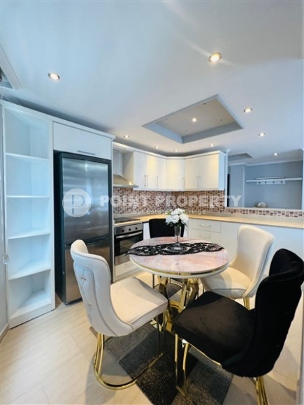 Стильная современная квартира 2+1, общей площадью 130 м2, в 400 метрах от моря в районе Махмутлар-id-4729-фото-3