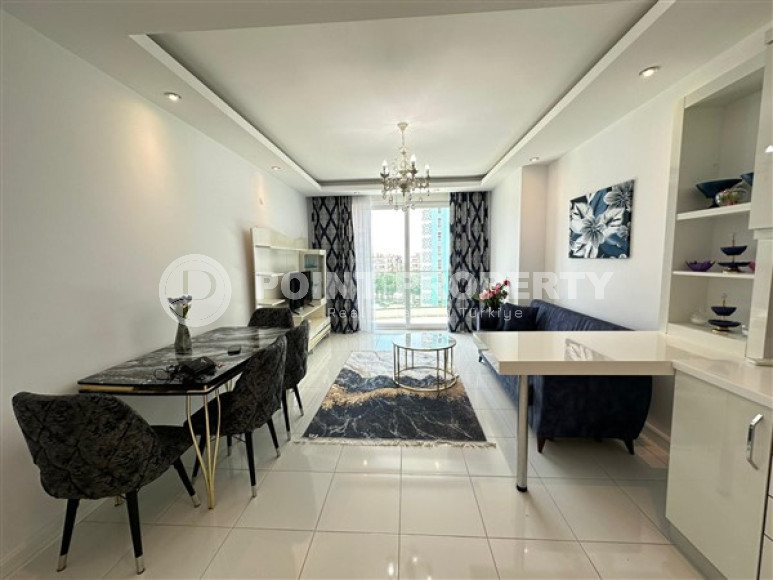 Классические апартаменты 1+1 с площадью 67 м2 в высотном комплексе района Махмутлар-id-4737-фото-2