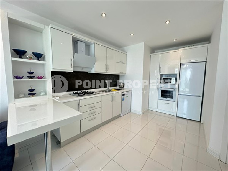 Классические апартаменты 1+1 с площадью 67 м2 в высотном комплексе района Махмутлар-id-4737-фото-3