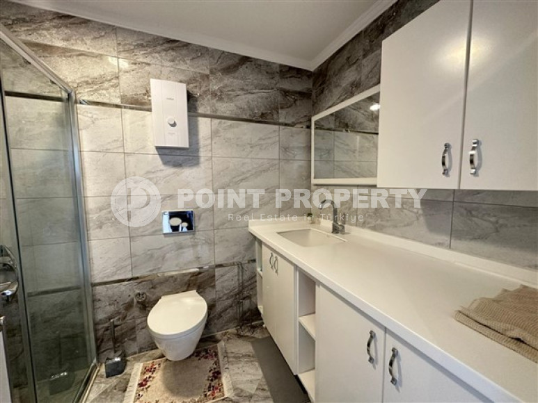 Классические апартаменты 1+1 с площадью 67 м2 в высотном комплексе района Махмутлар-id-4737-фото-7