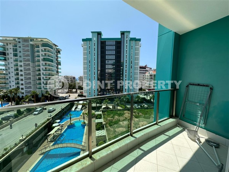 Классические апартаменты 1+1 с площадью 67 м2 в высотном комплексе района Махмутлар-id-4737-фото-8