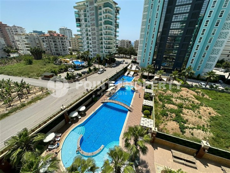 Классические апартаменты 1+1 с площадью 67 м2 в высотном комплексе района Махмутлар-id-4737-фото-9