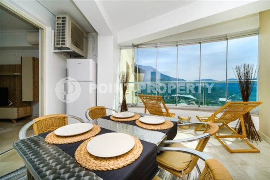 Красочная квартира с планировкой комнат 2+1 в превосходном комплексе на удалении от моря, Каргыджак-id-4738-фото-2