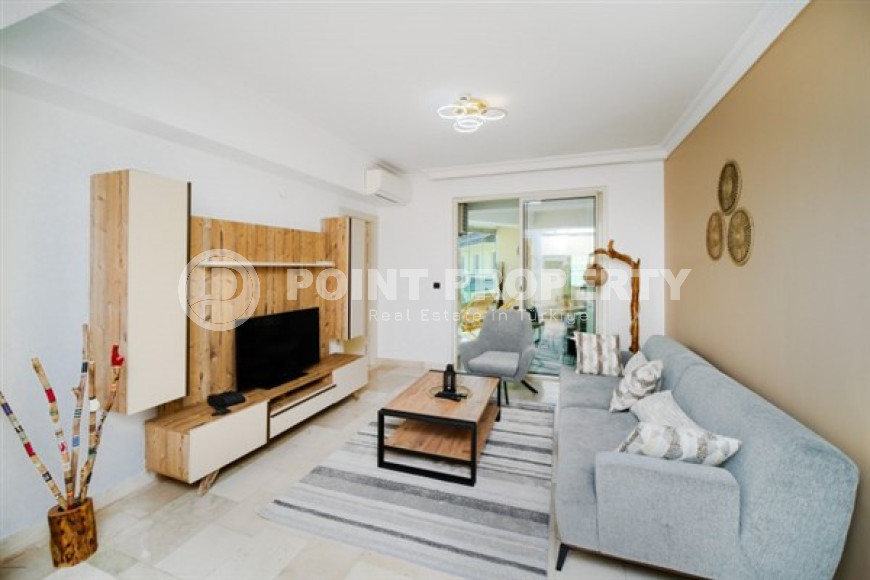 Красочная квартира с планировкой комнат 2+1 в превосходном комплексе на удалении от моря, Каргыджак-id-4738-фото-4