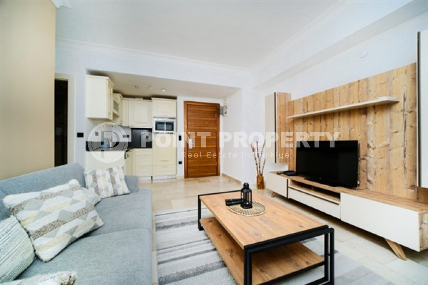 Красочная квартира с планировкой комнат 2+1 в превосходном комплексе на удалении от моря, Каргыджак-id-4738-фото-5