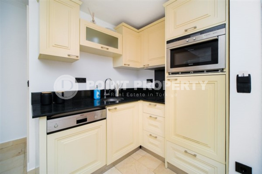 Красочная квартира с планировкой комнат 2+1 в превосходном комплексе на удалении от моря, Каргыджак-id-4738-фото-6