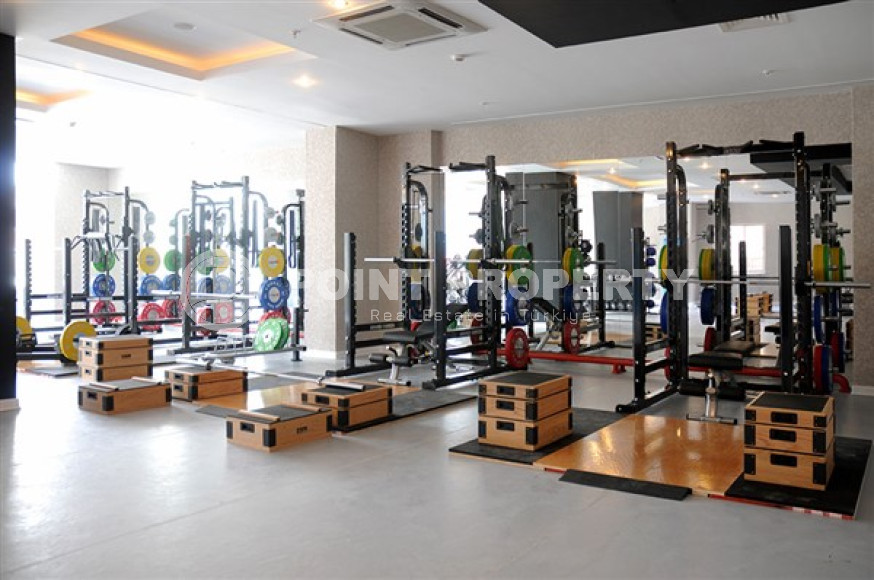 Красочная квартира с планировкой комнат 2+1 в превосходном комплексе на удалении от моря, Каргыджак-id-4738-фото-12