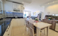Three-room comfortable apartment with furniture on the 8th floor of the complex, Mahmutlar district-id-4739-photo-1