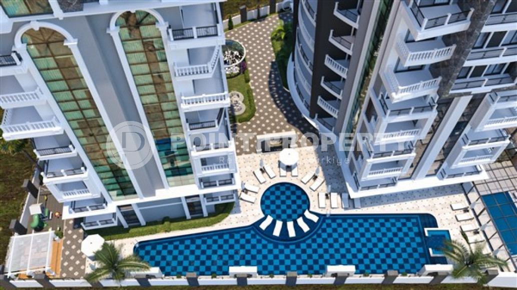 Двухкомнатная квартира в строящейся резиденции из двух блоков в центре Аланьи. Дата завершения работ - май 2024 года.-id-4744-фото-4