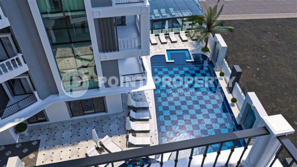 Двухкомнатная квартира в строящейся резиденции из двух блоков в центре Аланьи. Дата завершения работ - май 2024 года.-id-4744-фото-12