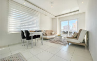 Comfortable furnished apartment 2+1 600 meters from the sea in the center of Mahmutlar-id-4752-photo-1