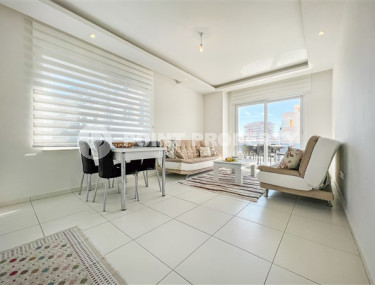 Comfortable furnished apartment 2+1 600 meters from the sea in the center of Mahmutlar-id-4752-photo-1