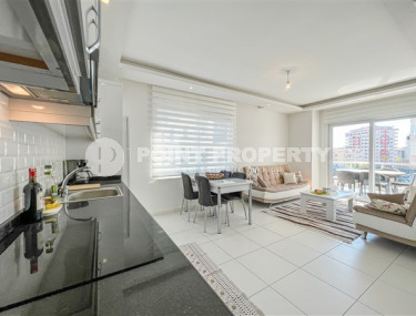 Comfortable furnished apartment 2+1 600 meters from the sea in the center of Mahmutlar-id-4752-photo-2