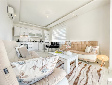 Comfortable furnished apartment 2+1 600 meters from the sea in the center of Mahmutlar-id-4752-photo-3