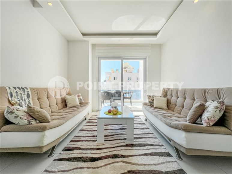 Comfortable furnished apartment 2+1 600 meters from the sea in the center of Mahmutlar-id-4752-photo-4