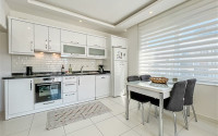 Comfortable furnished apartment 2+1 600 meters from the sea in the center of Mahmutlar-id-4752-photo-5