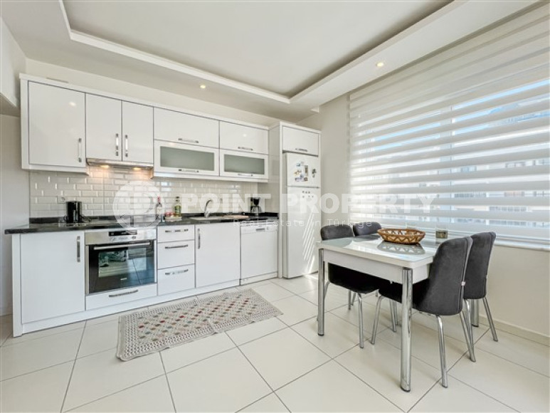 Comfortable furnished apartment 2+1 600 meters from the sea in the center of Mahmutlar-id-4752-photo-5