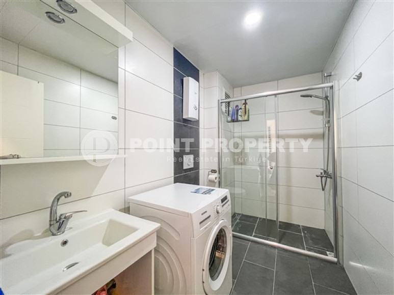 Comfortable furnished apartment 2+1 600 meters from the sea in the center of Mahmutlar-id-4752-photo-8