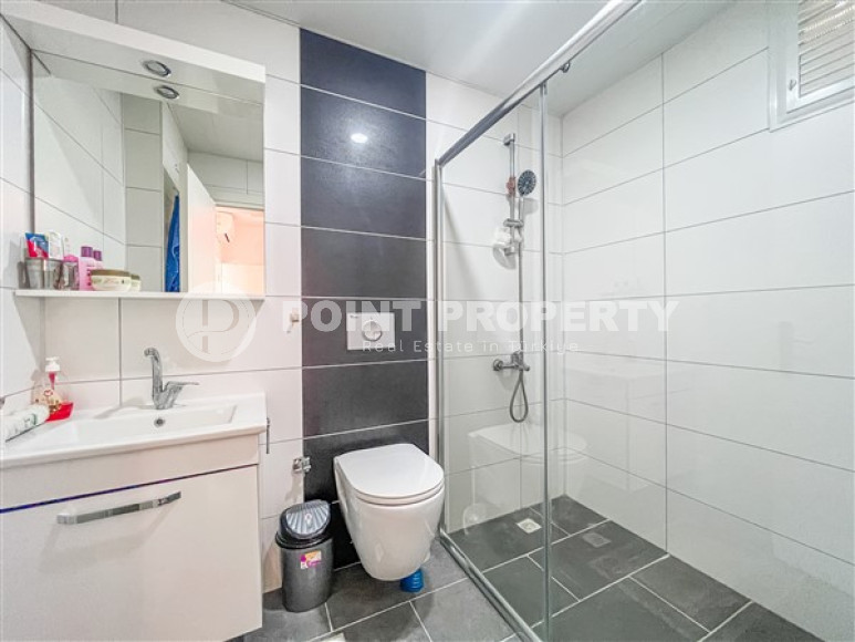 Comfortable furnished apartment 2+1 600 meters from the sea in the center of Mahmutlar-id-4752-photo-9